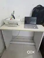 Gently used computer table with revolving chair for sale