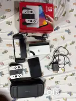 Nintendo switch OLED with 256 GB SD card and spigen cases
