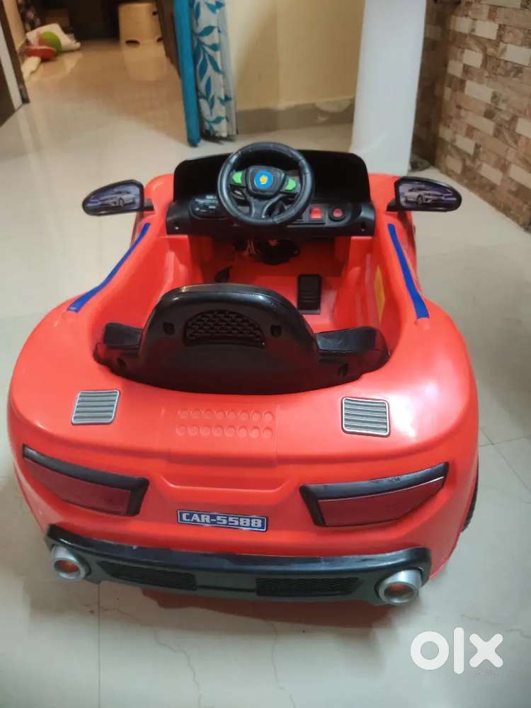 Electronic Car for Kids with Music & Light, Red colour.