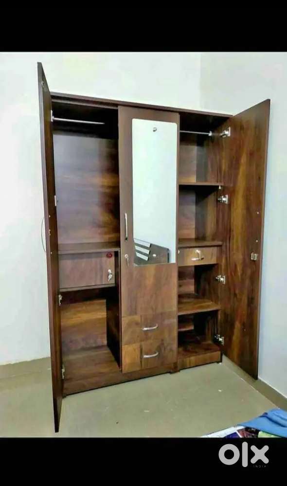 BRAND NEW 3 DOOR WARDROBE.