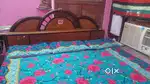 Selling double bed with mattress and side table