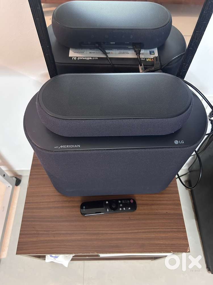 LG ECLAIRS 5.1 Dolby Sound bar and woofer