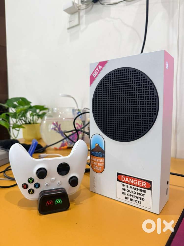 X Box Series S - 512 GB with controller, charging dock, extra battery.