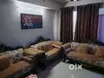 Stylish 7 seating sofa with center table for immediate sale.