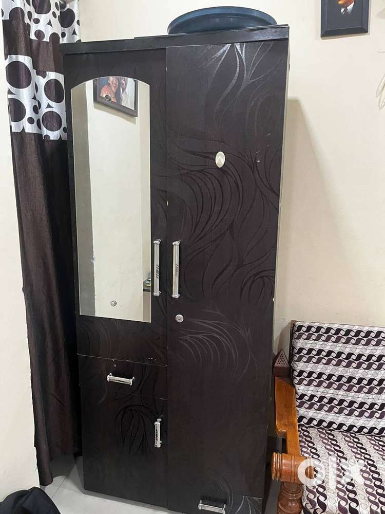 Wooden bed and wardrobe