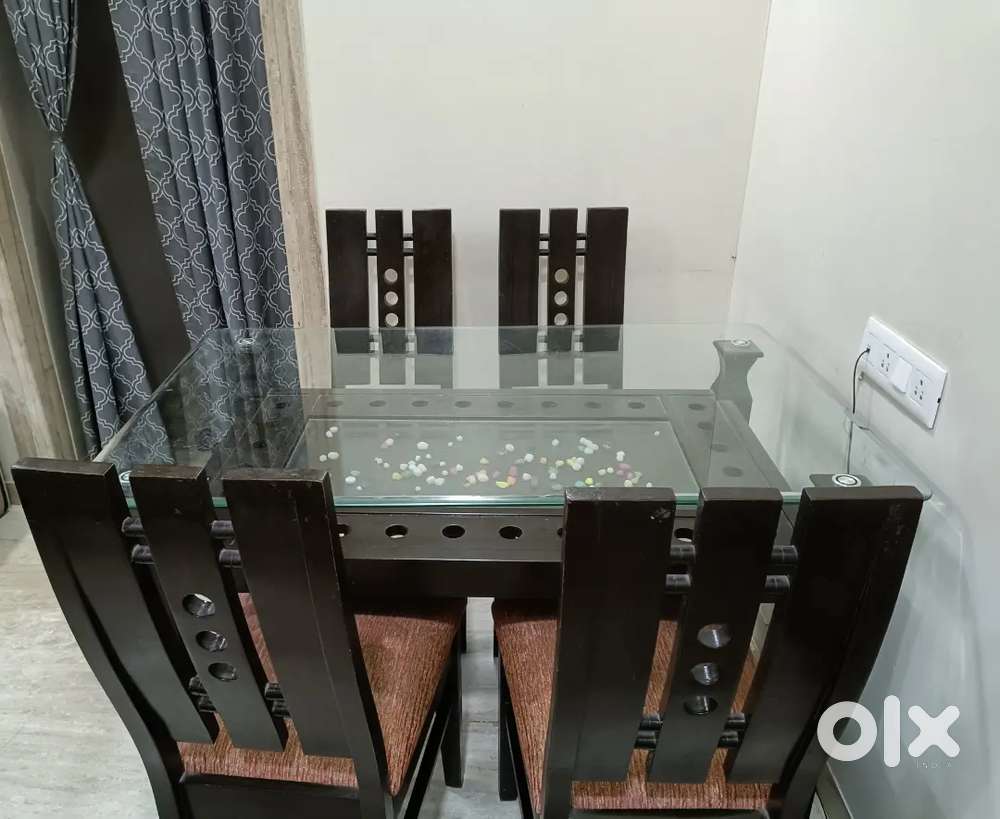 Good quality four seater dining table