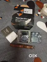 Super mint condition Fossil watch with all accessories and papers