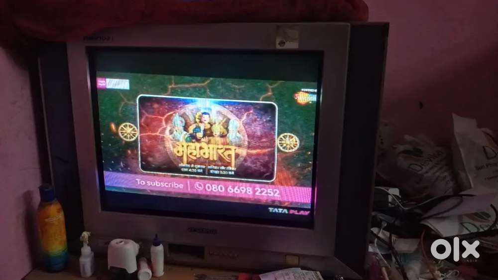 Big colour TV with altra sound system only 2k