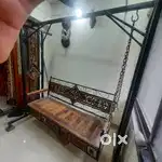 Wooden and Steel Swing (including roof not present in photo)