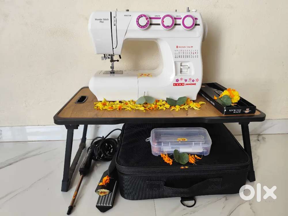 A Usha jamone wonder stitch plus machine
