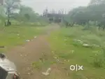 Land with 10000sqft building under construction with all papers ok
