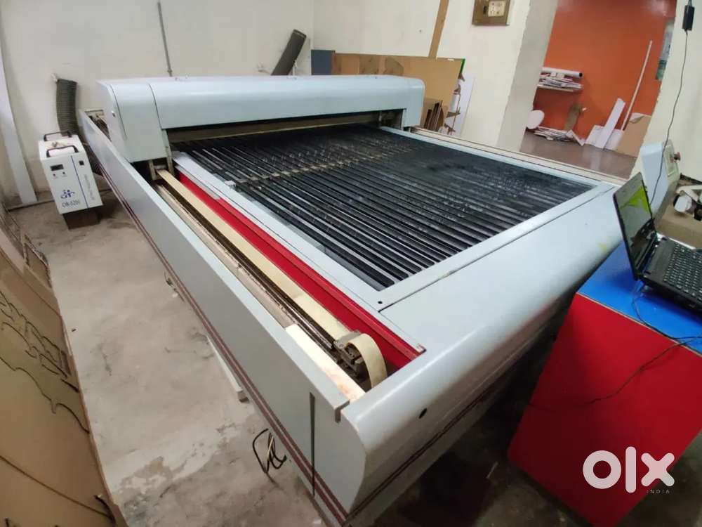 Laser engraving and cutting machine