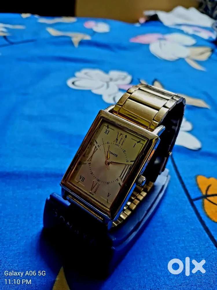 Sonata golden strap good condition watch with box