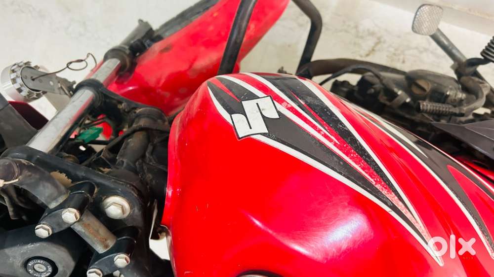 Red colour Suzuki hayalete  bike with New Bettery
