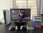 PlayStation 5 with monitor, sound bar,2 controllers,17 physical games