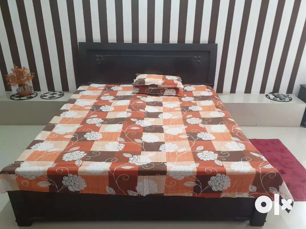 Double bed with box alongwith two Corform mattresses
