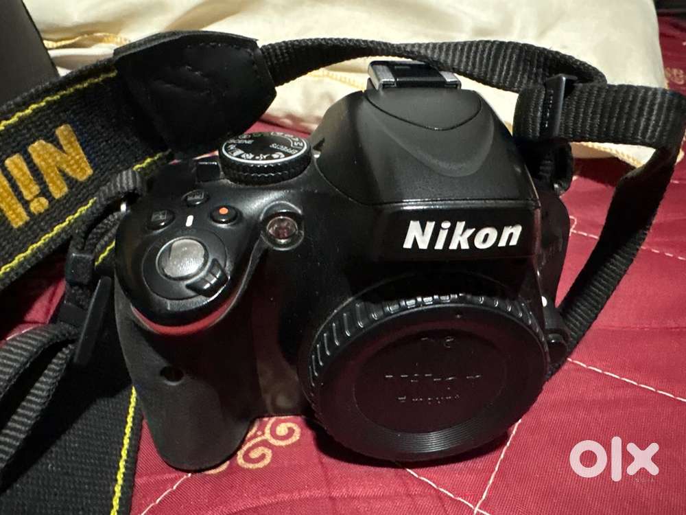 Nikon D5100 with lens
