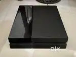 PS4 with 2 original controllers and 2 games