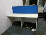 Modular workstation used. Office floor mat. Glass partition