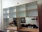 Wooden shop rack with mirror and shop counter