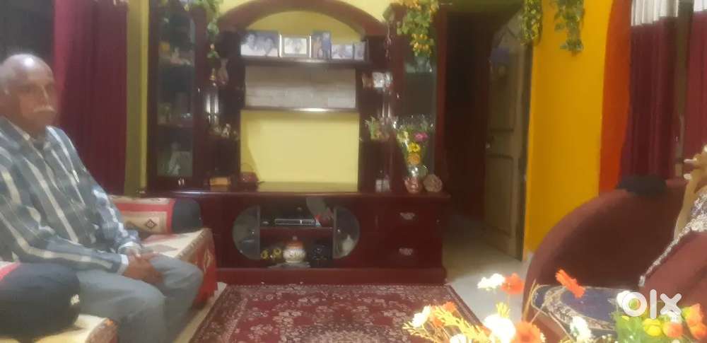 T V show case with drawing table.