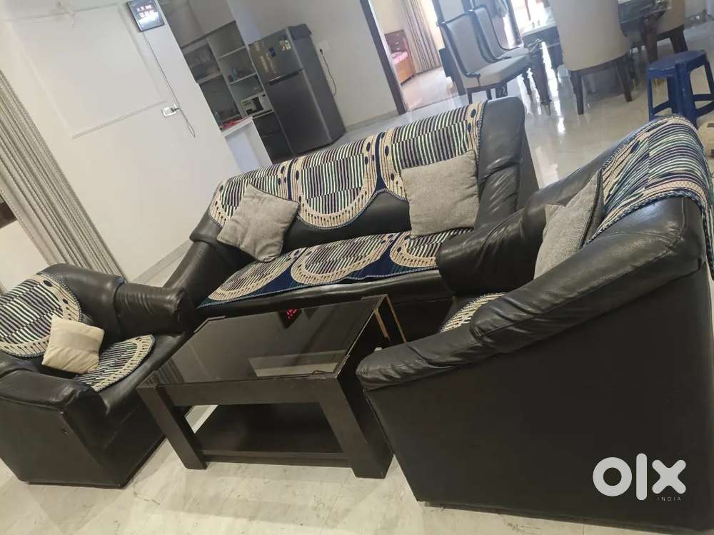 5 seater leather sofa with table