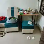 6 seater sofa with one table and dining table