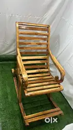 Brand new teakwood rocking chair