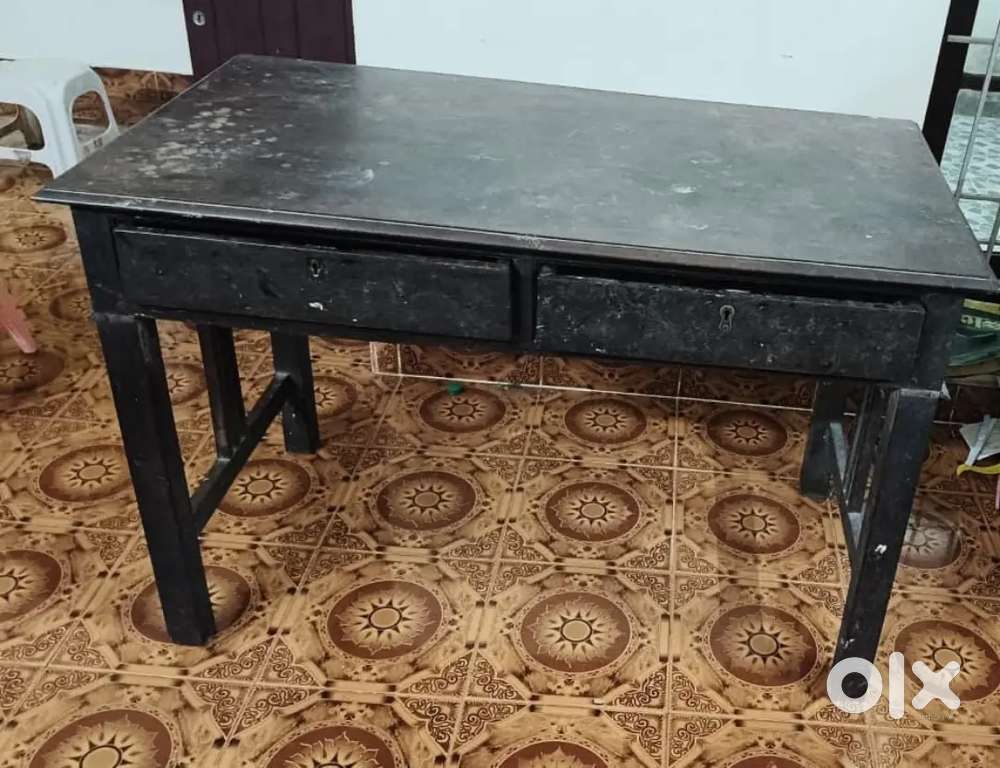 Teak wood table and a corner sofa 5 seater for sale good condition.