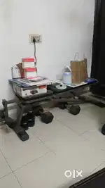 Exercise bench press and 15 kg dumbles