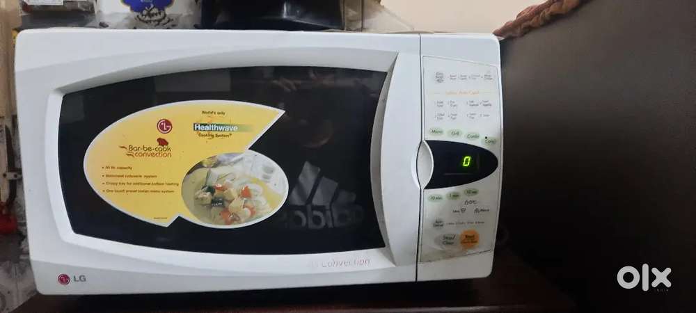 LG MICROWAVE COVECTION OVEN WITH BARBEQUE FOR SALE,30 LTR CAPACITY