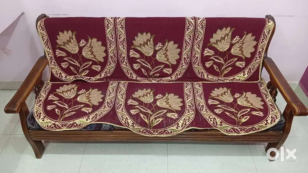 Heavy quality teak wood Sofa Set with 3+1+1. 6yrs old. New cushions.