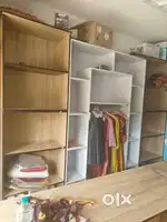 Table, racks, cupboards, hangers, things for dress shop