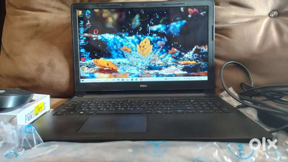 Inspiron laptop with mouse and charger