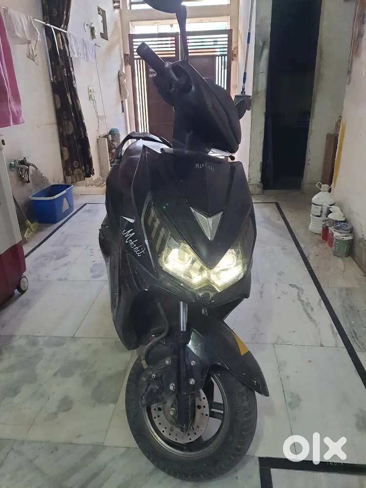 Electric scooty with 4 battery