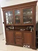 8 seater Dining table and chairs and a crockery shelf
