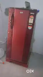 New showroom condition frige brown colour arjent sale mony problem