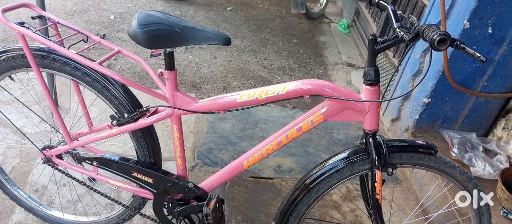 Pink, gray 3 hercules bicycle in full condition.