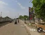 1000 yards commercial highway facing morumpudi
