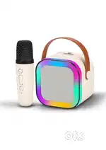 Mini bluetooth speaker with mic for singing   (fully good condition)