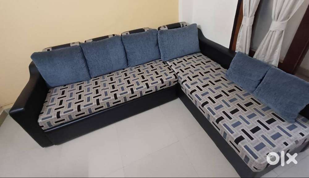 L shape sofa cum bed with storage