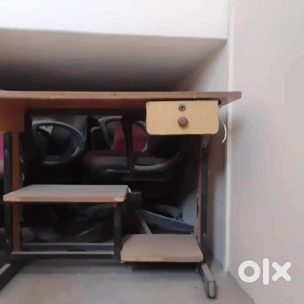 Computer desks and revolving chairs