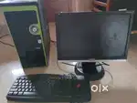 Desk top with three pieces of monitor cpu keyboard