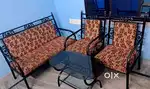 Wrought iron sofa set with center table