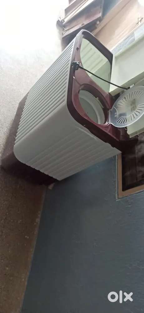 Above two years old semi automatic Haier washing Machine.