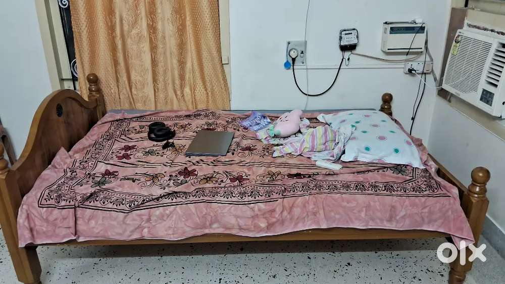 Wooden bed and mattress