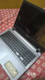 Asus Windows 10 laptop and multimedia keyboard mouse combo.