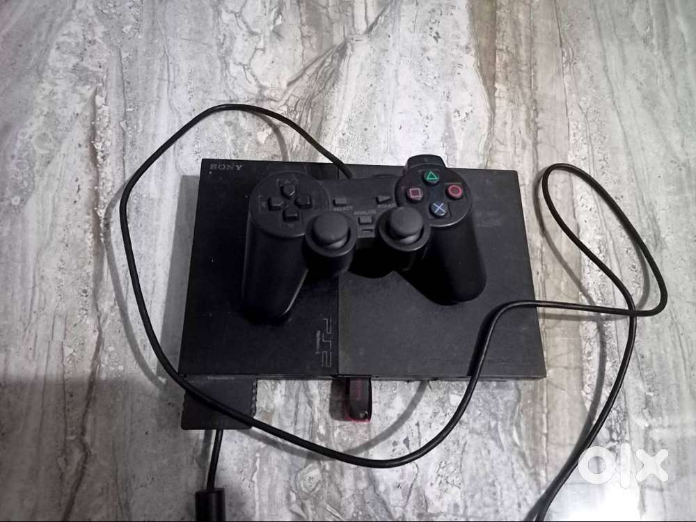 PS2 with 2 remotes and a pendrive for sell