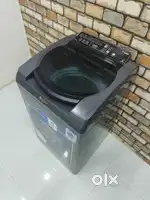 $098 Whirlpool stainwash 7.2kg washing machine maroon wit warranty