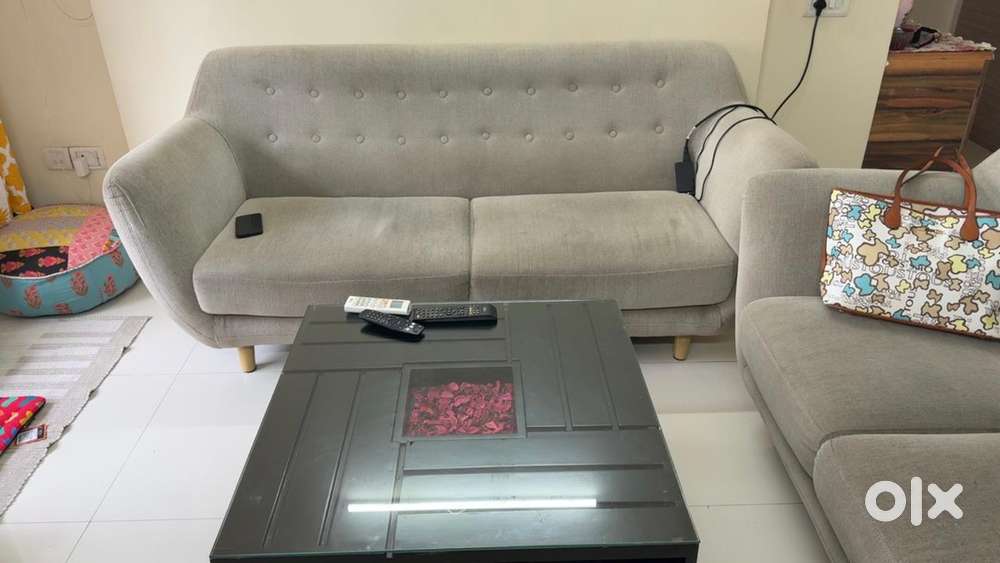 5 Seater sofa with covers and center table